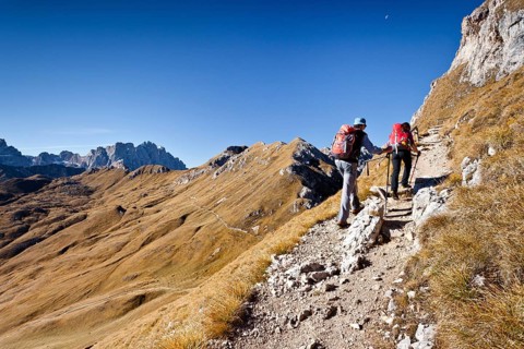 Climbers on the Peitlerscharte pass ascending to Peitlerkofel in Puez-Geisler Nature Park