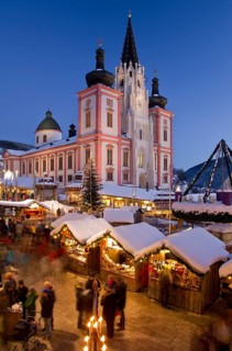 Christmas market in front of the Mariazell Basilica at the blue hour