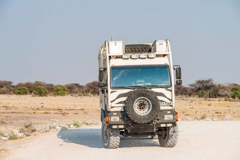 Truck with zebra stripes at the Chudop waterhole