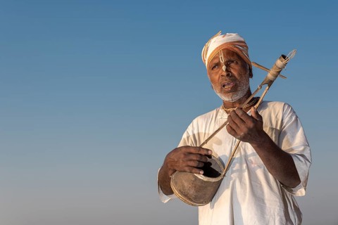 Musician playing an Ektara