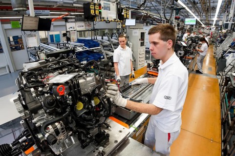 Man working on the production line of the Audi A3 at the Audi plant