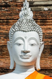 Buddha statue in front of the stupa at Wat Yai Chai Mongkhon