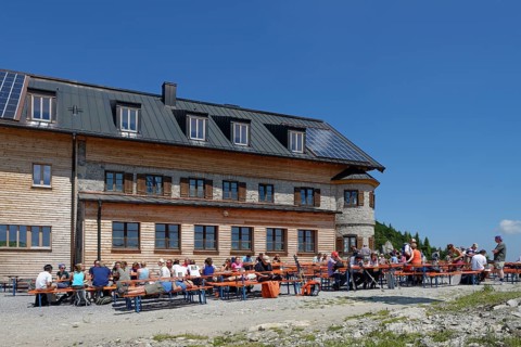 Hikers having a rest at Rotwandhaus