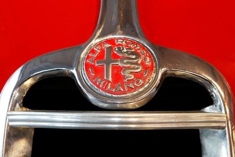 Alfa Romeo logo on a car
