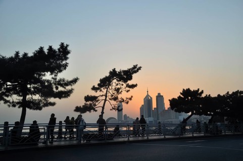 Waterfront promenade with the skyline of Qingdao
