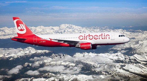 Air Berlin Airbus A320-214 in flight over the Alps