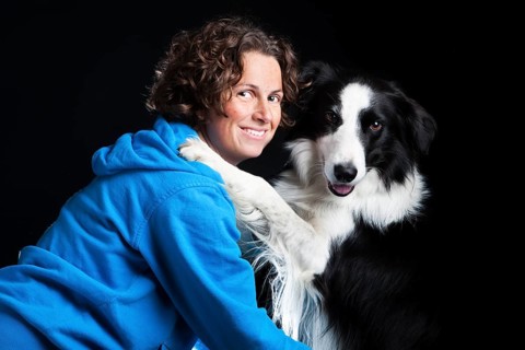 Young woman with a Border Collie