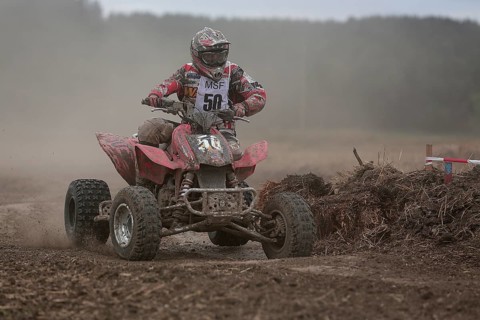 Quad rider on a field