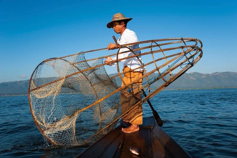 Fishermen with a traditional basket