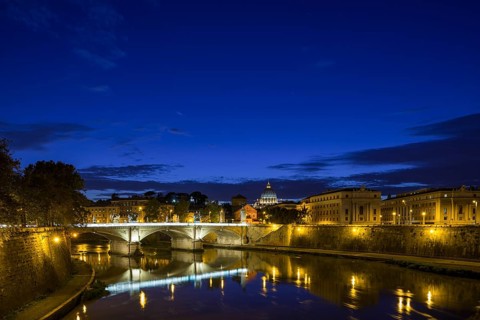 View across the Tiber river to St. Peter's Basilica