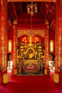 Historical bronze Buddha in the Viharn of Phra Kaeo