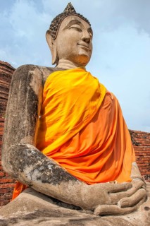 Buddha statue next to the central stupa