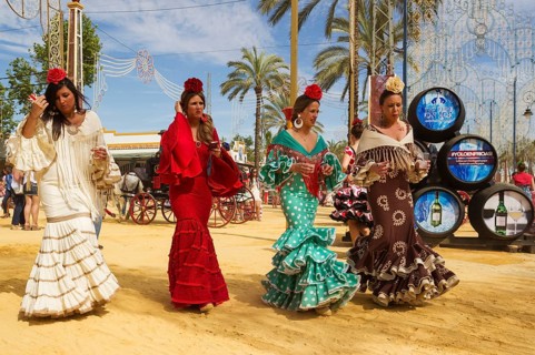 Women wearing gypsy dresses at the Feria del Caballo