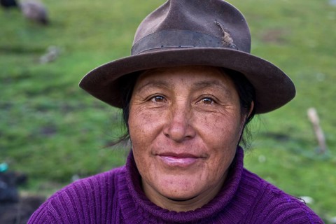 Friendly Quechua Indian woman wearing a hat