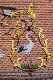 Hanging sign of the 'Zum Storchen' restaurant