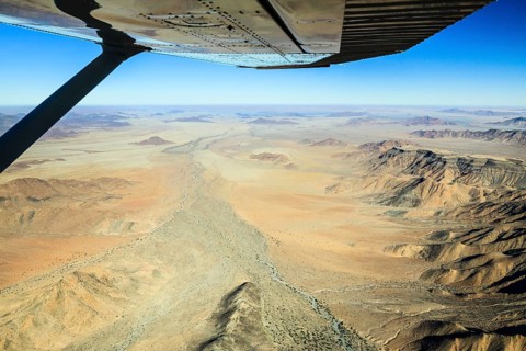 View from a small plane over the foothills of the Namib Desert