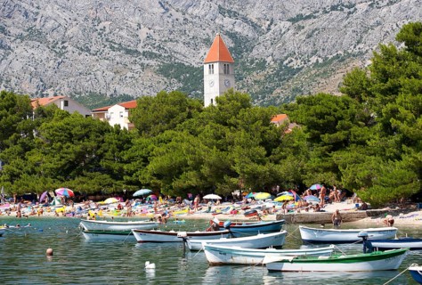 Fishing boats off bathing beach