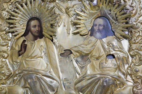 Religious stamped silver metal carvings inside the mausoleum