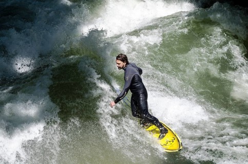 Surfer surfing the Eisbach stream