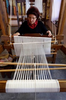 Woman working on a loom