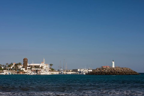 Marina with lighthouse in Caleta de Fuste