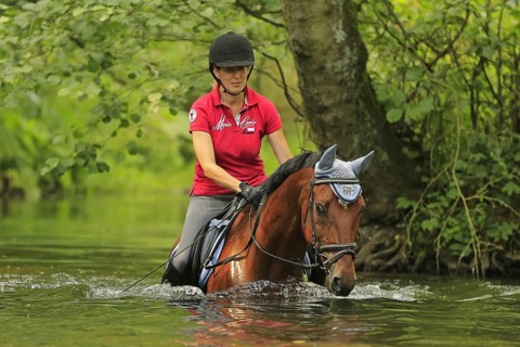 Woman riding a horse