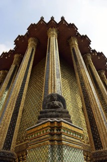 Buddha statue in front of the Mondop