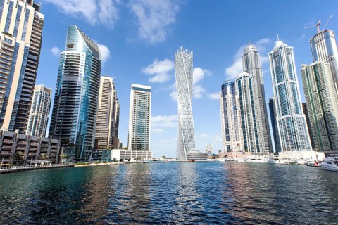 Cayan Tower and skyscrapers with marina
