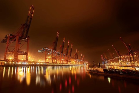 Waltershoferdamm 2 with the cranes of Container Terminal Burchardkai and EUROGATE Container Terminal