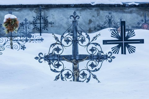 Grave crosses in deep snow