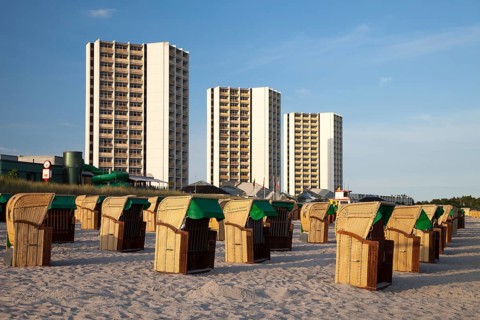 High-rise buildings and wicker beach chairs on the south beach
