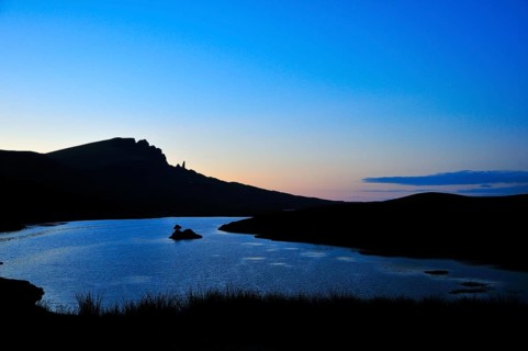 View at dusk across Loch Fada to The Storr with the Old Man of Storr pinnacle