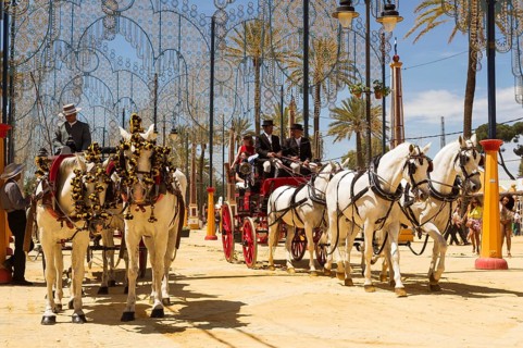Decorated horses and dressed up coachmen at the Feria del Caballo Horse Fair