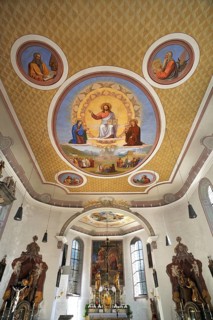 Chancel with ceiling paintings in the early-Neoclassical church of St. Antonius