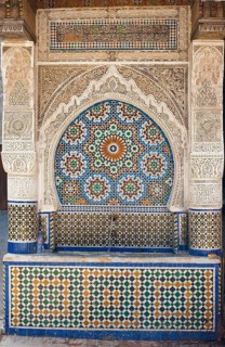 Traditional water fountain with mosaics and stucco work