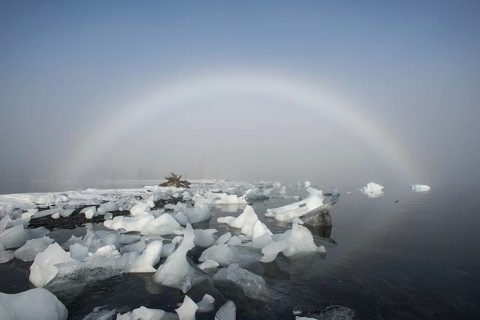 A fog rainbow and beached icebergs at Pakenham Point