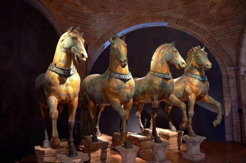 Four bronze horses
