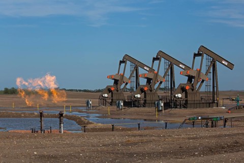 Natural gas is flared off as oil is pumped in the Bakken shale formation