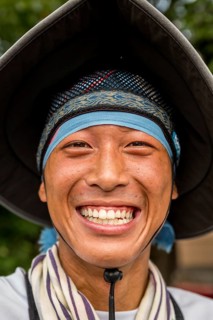 Portrait of a smiling Japanese rickshaw puller