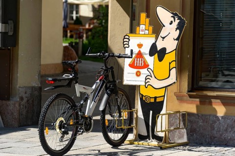 Bicycle stand with the HB-Mannchen advertising character