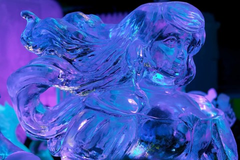 Female figure with flowing hair made of ice