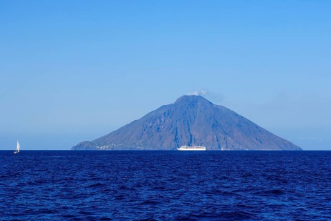 Isola Stromboli with erupting volcano Mt Stromboli