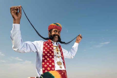 Local man presenting his long mustache