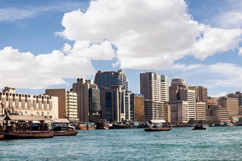 Heavily laden traditional dhows on the Dubai Creek