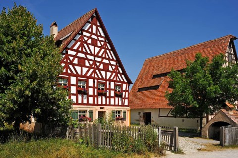 Half-timbered farmhouse on stone base