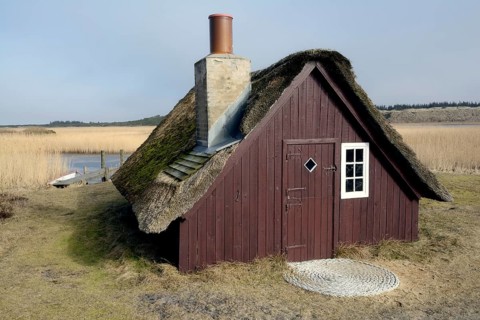 Old fishing hut with a thatched roof
