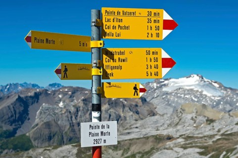 Signposts on Mt Pointe de la Plaine Morte near Crans-Montana