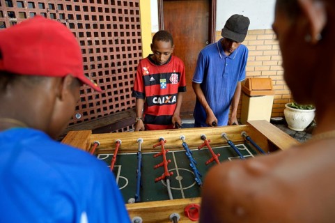 Boys playing table football