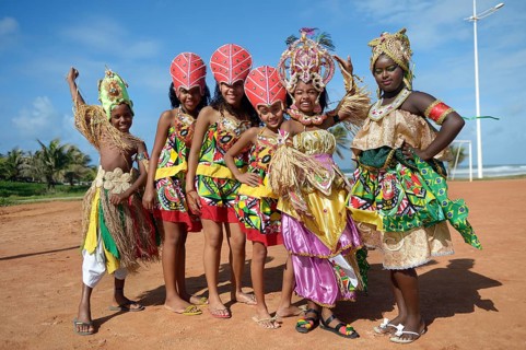 Colourfully dressed children of a traditional Afro-Brazilian musical group