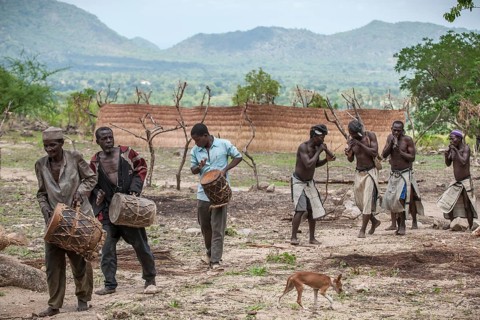 Men of the Koma people with instruments
